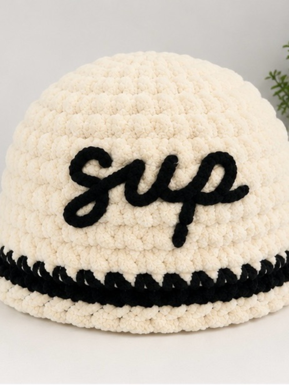 Cream Crochet Beanie with Black Script Accent